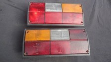 VW TRANSPORTER T25 REAR LIGHTS LENS PAIR 1980-91 HELLA T3 251945111 /112
