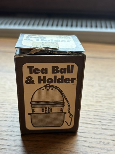 Vintage tea ball with holder - vintage,