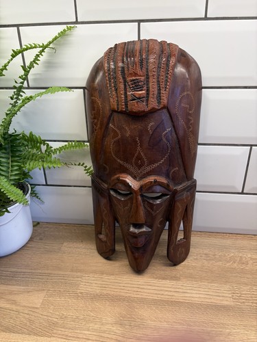 Hand carved dark wood - carved,