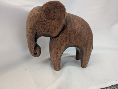 Hand carved wooden - hand, elephant
