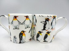 A pair of Penguin design Bone