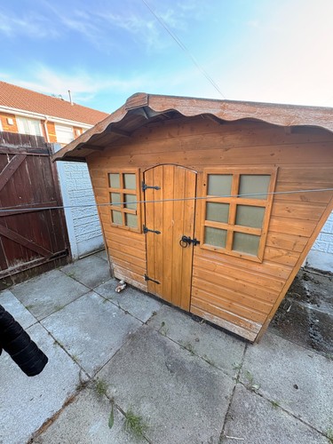 Wooden wendy house used - , but