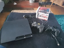 Ps3 250GB With 8 Games. One Official Controller And A Madcatz Battery Controller
