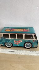Camper van tin: surfers