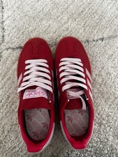 Red and pink adidas spezial