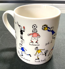 Football Mug by Tyrrell Katz