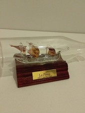 Glass Ship In A Bottle On A