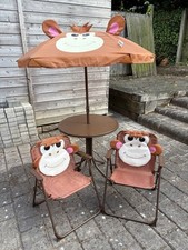 Outsunny Kids Foldable Four-Piece Garden Set w/ Table, Chairs, Umbrella - Brown