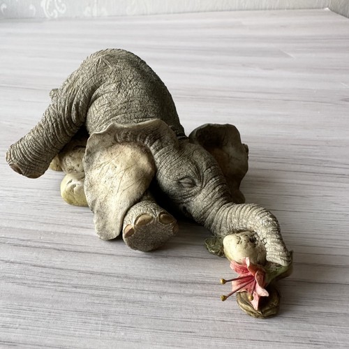 Tuskers elephants weary - tuskers,