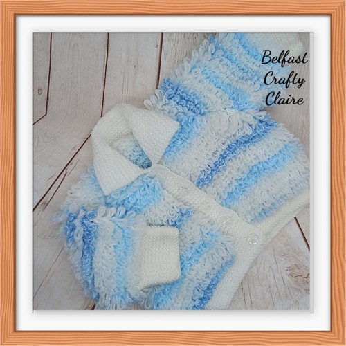 Hand knitted baby - hand,
