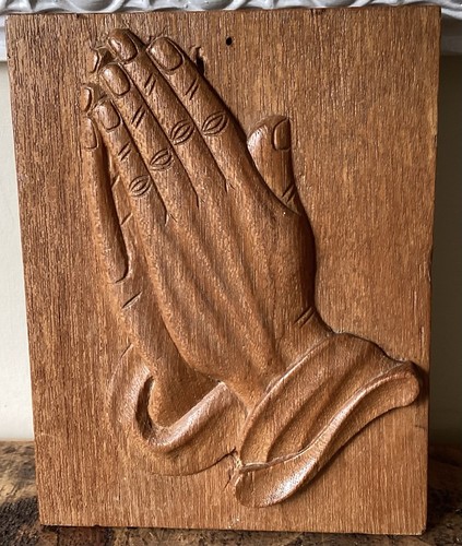 Hand carved wooden praying - hand,