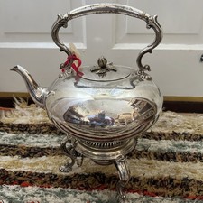 Antique Spirit Kettle Tilting
