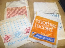 4 vintage advertising paper
