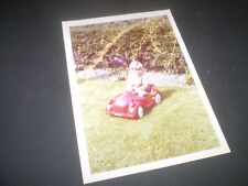 social history 1960's  boy in toy pedal car garden colour  photograph 5.5'inch