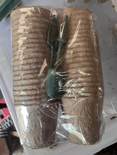 Brown round peat fibre seed - peat,
