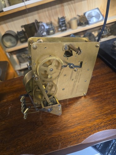 Antique clock mechanism with - clock,