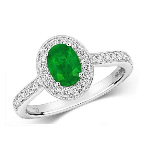 Real emerald and diamond oval - and,