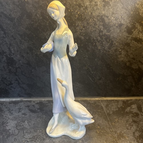 Figurine girl feeding - figurine,