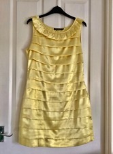 Good  quality yellow dress-size 12. Lined- side zip closure-size 12