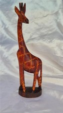 A Wooden Hand Carved  model of  a Giraffe. 31 cm Tall African