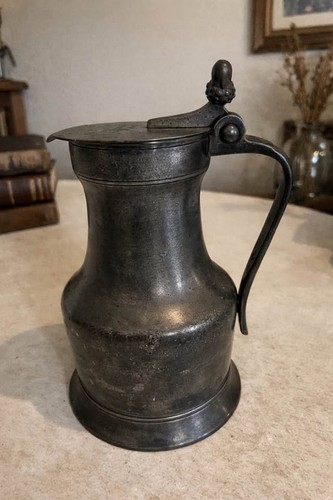 Pewter wine pitcher with