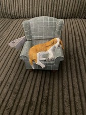 Next Sleeping Dog In Armchair