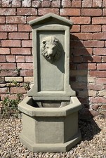 LARGE STONE LIONS WALL WATER