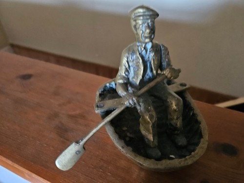 Vintage brass boat ornamet man - vintage,