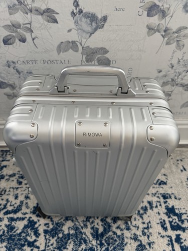 Rimowa cabin luggage wheel - luggage,