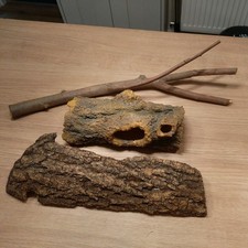 Bundle of decorative items for vivarium.  Branch, bark and resin hide. 