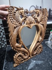 Mirror carved wood frame