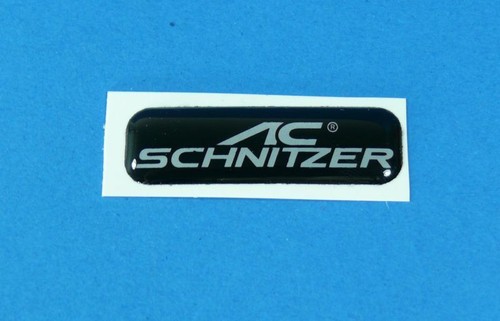 Schnitzer emblem vitro - ac,