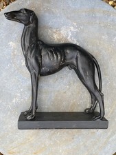 statue of a greyhound dog on plinth base