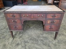 Antique Victorian 7 drawer writing desk cream  leather top tapered legs  castors