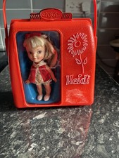 Vintage Remco Heidi Pocketbook doll in her purse with clothes and shoes c. 1964