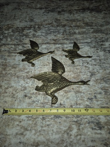 Brass flying ducks wall - ducks,