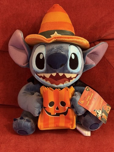 Stitch holding candy corn - stitch,