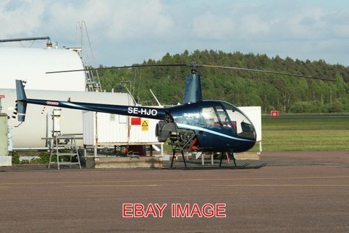 Photo helicopter robinson r22 - helicopter,
