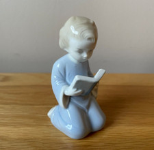 Vintage Metzler and Ortloff Child Reading Book Porcelain Figurine Made Germany