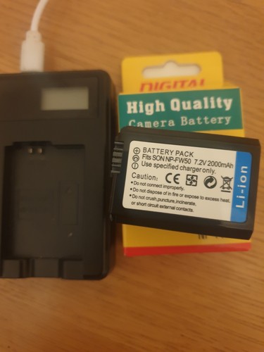 Sony battery charger - +,