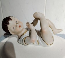 Bisque Piano Baby On Back