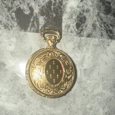 Reuge Swiss Made Gold Tone