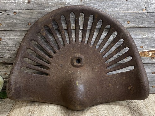 Cast iron tractor seat - cast,