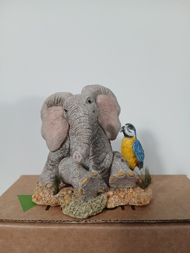 Tuskers elephant parrot - elephant,