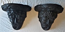 A pair of large antique hand carved oak corbels, wall shelves, depicting Bachus