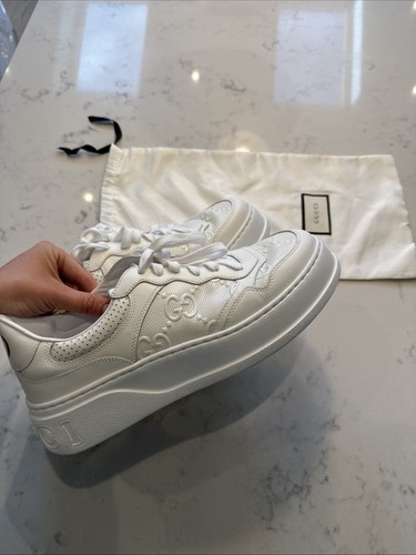 Gucci embossed leather - gg,