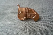 old style ambulance? or army truck? pin label badge