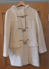 "MARK AND SPENCERS" CREAM LINED WITH ZIP DUFFLE COAT. SIZE UK14.
