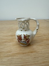 Crested China South Kensington Museum Puzzle Jug - Crest for Llandudno + Verse