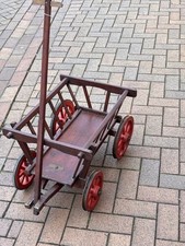 old vintage dog cart/ pony cart with wooden wheels